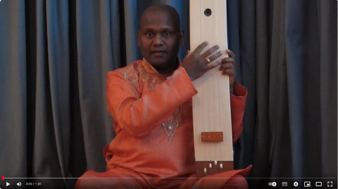 Manickam Yogeswaran sings kalyani ragam in C sharp